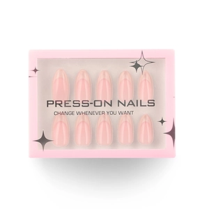 Short almond press-on nails in nude pink finish presented in a premium window display box