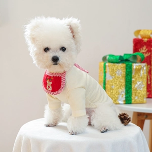 Close-up of pet Christmas bandana with reindeer embroidery and soft striped knit dog shirt