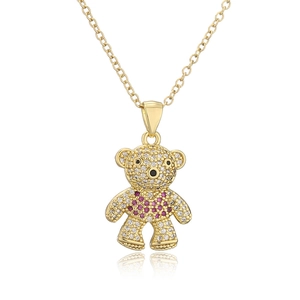 Detail of gold-plated bear pendant necklace featuring pink and clear cubic zirconia micro-inlays