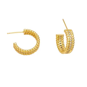 Chic gold-plated C-shaped hoop earrings with twisted texture and white zircon stones