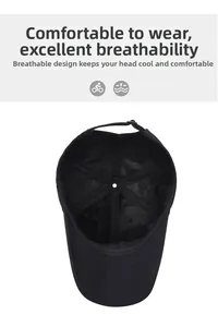 Detailed interior of a black baseball cap showing six-panel stitching and adjustable strap