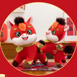 Detailed view of red 2026 Year of the Horse plush mascots with golden embroidery details