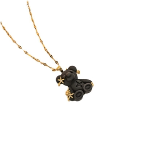 Gold-plated stainless steel necklace with black resin bear pendant and zircon star inlay
