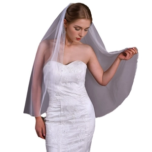 Elegant white tulle bridal veil with handmade beaded tassels and metal hair comb