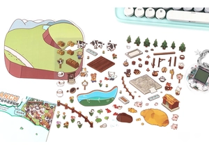 Detailed stickers showing cartoon farm animals and scenery on a white background