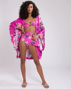 Detailed view of magenta tropical floral bikini set with brown ring buckles and cover-up