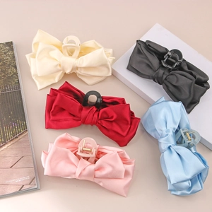 Five-color satin bow claw clips in beige, black, red, blue and pink for elegant hairstyling