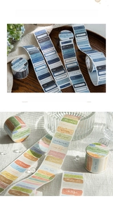 Detail of vintage scrapbooking label tapes with elegant English quotes for DIY decoration