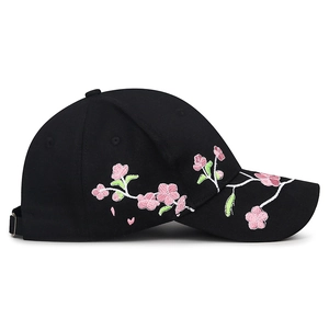 Black baseball cap with pink plum blossom embroidery and adjustable metal buckle back