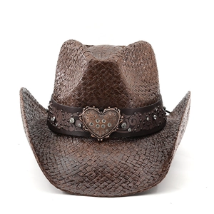 Brown straw cowboy hat with rhinestone heart buckle and vintage western belt detailing