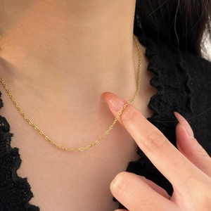 Minimalist 925 sterling silver thin gold chain necklace worn on neck with lace outfit