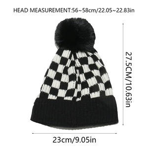 Detail view of checkerboard knit beanie with size specs 56-58cm head measurement