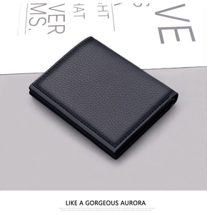 Close-up of black lychee texture leather wallet with slim minimalist design