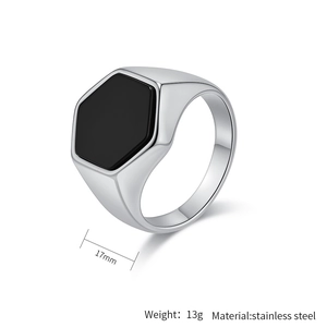 Macro side view of silver hexagonal signet ring with black stone inlay and dimensions