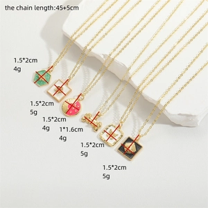 Gold-plated hip-hop necklace with enamel pendants featuring star moon and bow patterns