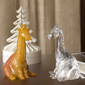 3D Giraffe resin molds for DIY crafts including amber and transparent finished statues