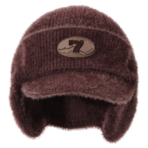 Thick dark brown faux fur trapper hat with leather patch for winter cycling and warmth