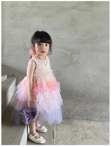 Detail of gradient mesh princess dress showing layers of pink, purple, and blue tulle fabric