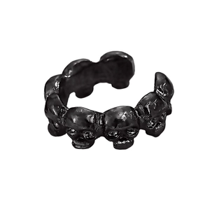 Gothic black skull ring with adjustable open design and detailed punk aesthetic