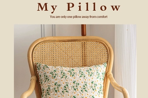 Detailed close-up of embroidered daisy patterns on a square floral throw pillow cover