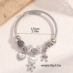 Silver bead bracelet with bear heart charms showing 2.19in diameter and 0.7oz weight