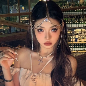 Elegant crystal forehead tassel chain with pearl cross necklace in romantic night setting