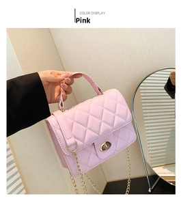 Pink quilted leather chain bag with golden twist lock detail and metal shoulder strap
