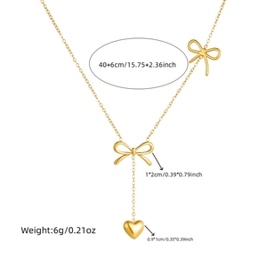 Vergoldete Edelstahlkette mit Schleife und Herzanhänger auf einer 40+6cm Kette