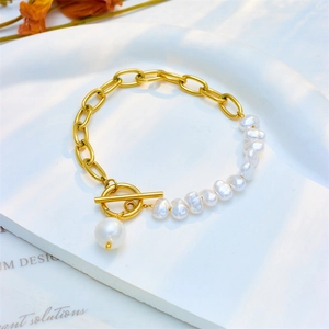 Punk asymmetric gold chain and pearl beaded bracelet with OT toggle clasp and pearl pendant