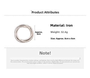 Detail showing silver coiled geometric bangle with 32.6g weight and 8cm diameter specs