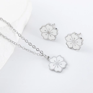 Silver stainless steel cherry blossom necklace and earrings set with white enamel inlay