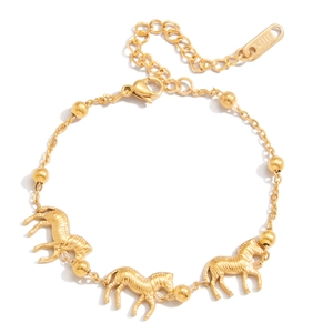 Elegant 18k gold plated stainless steel bracelet featuring zebra charms and gold beads