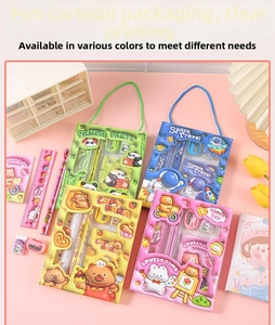 Detailed view of four colorful children's stationery gift sets with cartoon themes