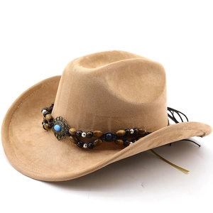 Detail of light brown suede cowboy hat with bohemian turquoise bead band decoration