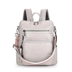 Detail view of large capacity vintage backpack featuring textured woven straps and PU leather