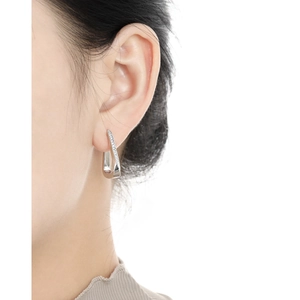 Minimalist S925 sterling silver triangle earrings with micro-inlaid zircon on model