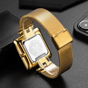 Macro shot of gold square watch stainless steel back with waterproof engraving