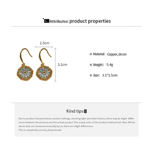 Detailed view of French vintage floral earrings with colorful enamel and zircon stones