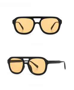 Front and side view of retro flat top aviator sunglasses with black frame and orange lenses