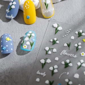 3D embossed nail stickers with floral Lily of the Valley patterns and butterflies