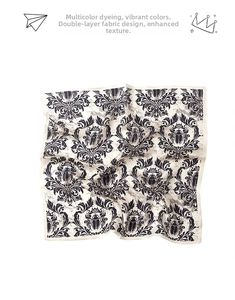 Detailed close-up of double-layer silk scarf featuring vintage beetle and floral prints