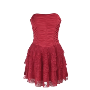 Sleeveless red strapless dress with slim-fit ruched bodice and layered lace hemline