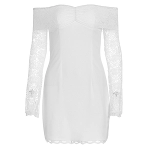 Detail of floral lace stitching on off-shoulder white mini dress with eyelash hem