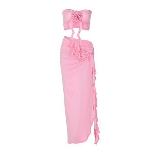 Pink two-piece set featuring 3D rose tube top and long ruffled slit skirt in trendy summer style