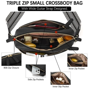 Internal structure of small black leather crossbody bag showing three zipper compartments