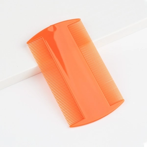 Orange double-sided fine-tooth flea comb for pets made of durable plastic material