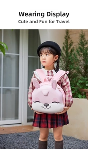 Outdoor model wearing pink EVA rabbit toddler backpack with 3D ears for preschool girls