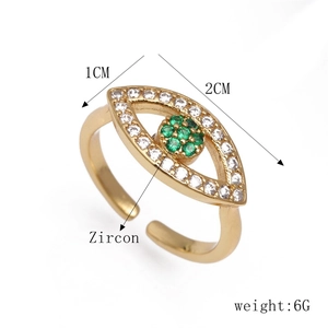 Vue détaillée bague œil dorée ajustable avec zircons blancs et verts et dimensions du bijou