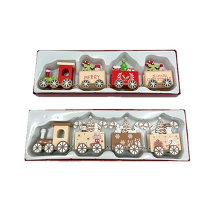Classic wooden Christmas train decorations with mini trees and snowmen in gift boxes