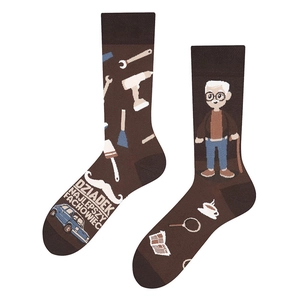 Detail of asymmetrical crew socks featuring Polish text and vintage knitted patterns